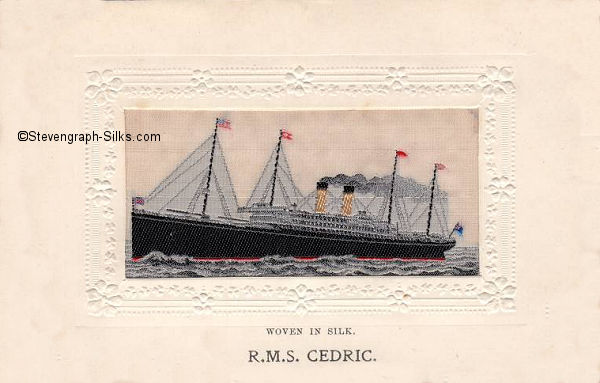 woven image of ship, with small flags on all four masts and ships name printed below silk