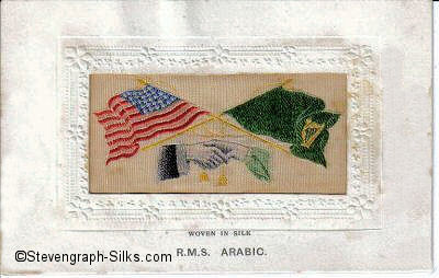 woven image of USA and Irish flags, with man's and woman's hands, but with man's hand having five fingers plus a thumb.