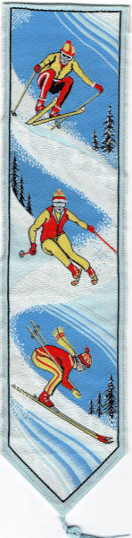 J & J Cash woven bookmark, without any words, but image of three skiers