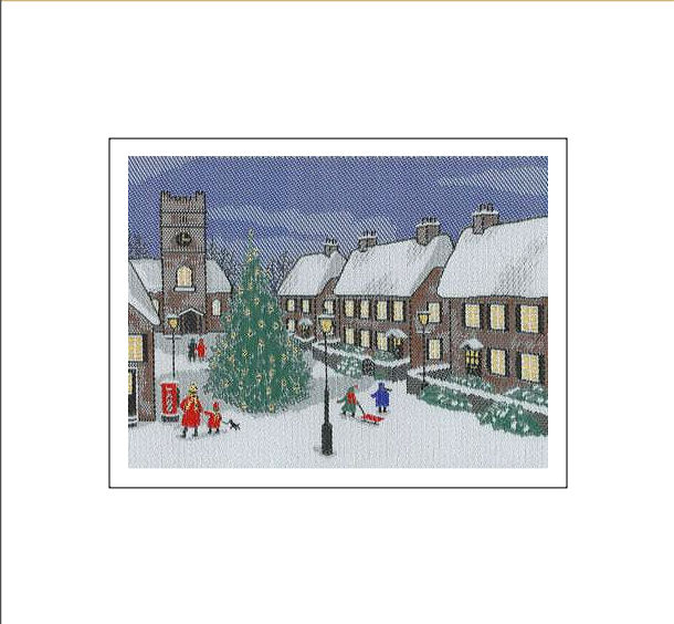 J & J Cash woven Christmas card, with no words, of a street scene with a Christmas Tree and children with a toboggan, and titled: VILLAGE