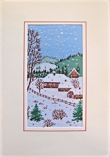 J & J Cash woven card, with no title words, but image of a snow covered village