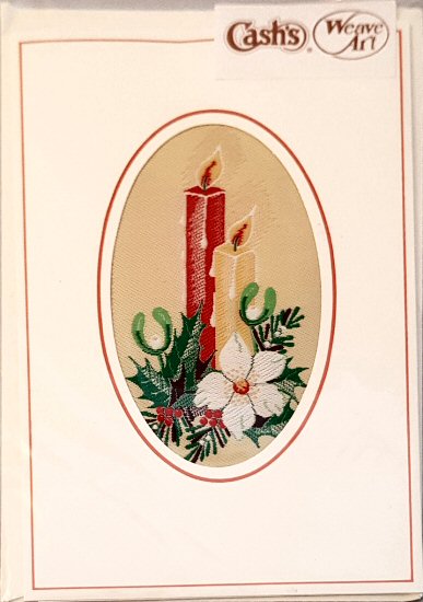 J & J Cash woven Christmas card, with no words, but image of two candles with white flower