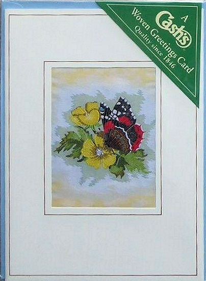J & J Cash woven butterfly and flower card, with no title words, but picture of a Red Admiral butterfly & Buttercup flowers