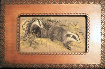 J & J Cash wooden box with woven picture of two badgers