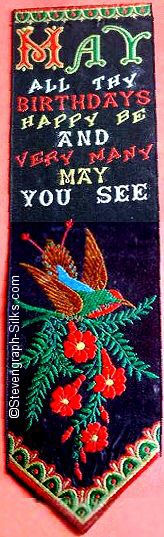 Bookmark with words and image of multicoloured bird purched on branch and leaves