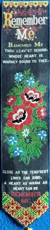 silk bookmark with woven title, words of verse, image of flowers and more words of verse