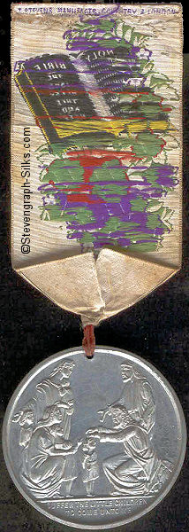 rear view of ribbon with words: St. George's, and medal attached