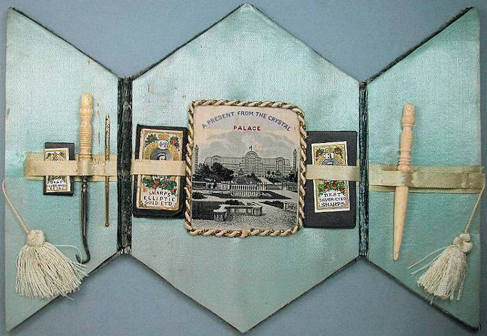 lace making needle case, with woven view of the Crystal Palace, and two fold over flaps