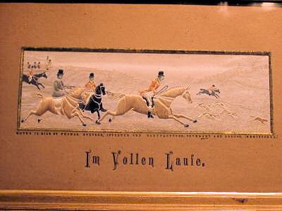 Image of horses and riders following fox hounds as they chase after a fox, with German words, Im vollen Laufe, printed on card mount