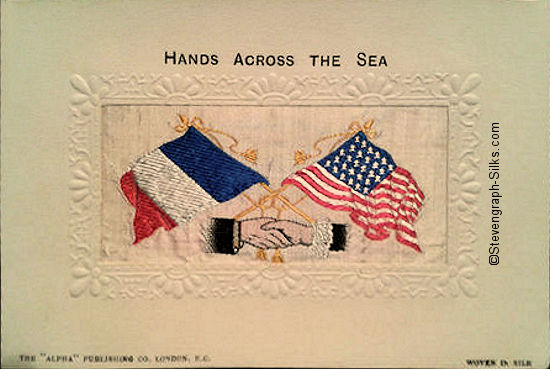 Alpha series postcard of Stevens Hands Across the Sea, with woven flags of France and USA