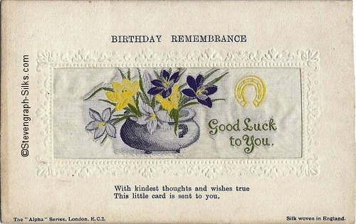 Alpha series postcard with woven GOOD LUCK TO YOU words, with printed title and words below silk