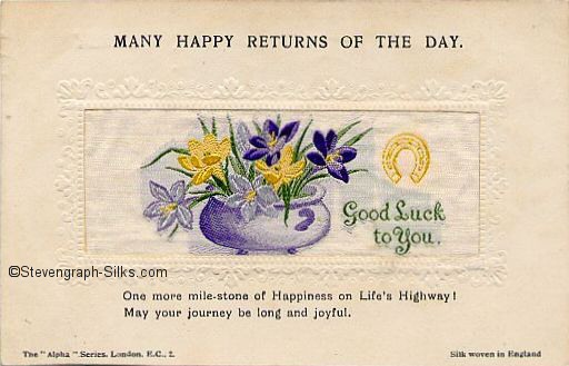 Stevens Alpha series postcard with bowl of 6 flowers, and inverted yellow horse shoe