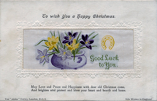 Stevens Alpha series postcard with bowl of 6 flowers, and inverted yellow horse shoe
