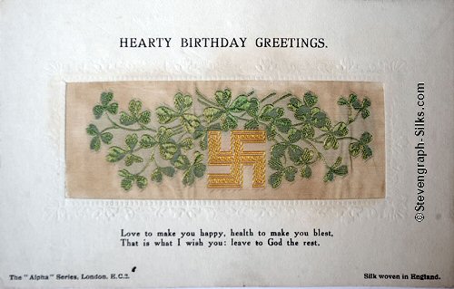 Alpha series postcard with no woven words, just cross design and shamrock, with printed title and words below silk