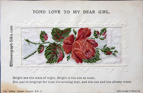 Alpha series postcard with no woven words, just image of a single rose and rose bud, with printed title and words below silk