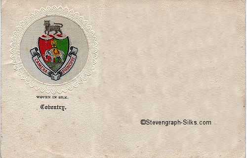 postcard with small circular woven silk depicting the Coventry Coat of Arms