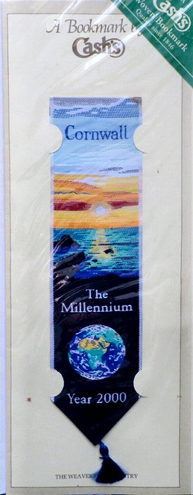 J & J Cash woven bookmark, with title words and image of sunrise