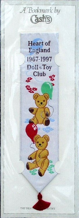 J & J Cash woven bookmark, with title words and image of two teddy bears with multiple coloured balloons
