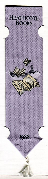 Cash's woven bookmark, with title words, date and image of books