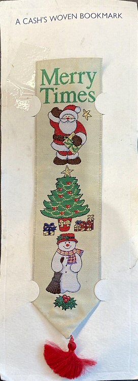 Cash's woven bookmark with woven title words above picture of santa, christmas tree & snowman