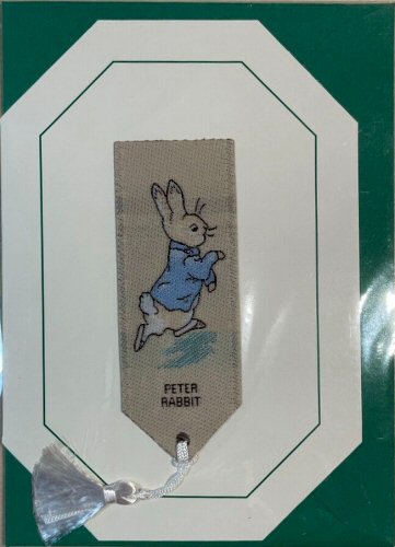 Cash's greeting card, with an attached woven bookmark titled: PETER RABBIT