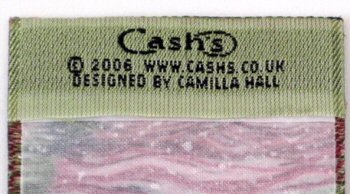 Cash's woven name on the reverse pointed end of this bookmark