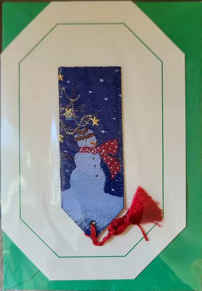 Cash's greeting card, with an attached woven bookmark with image of a Snowman, but no words.