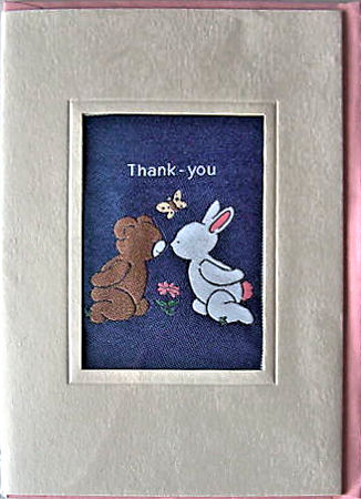 J & J Cash's greetings card with words woven on tapestry, THANK YOU, and image of a pair of teddy bears