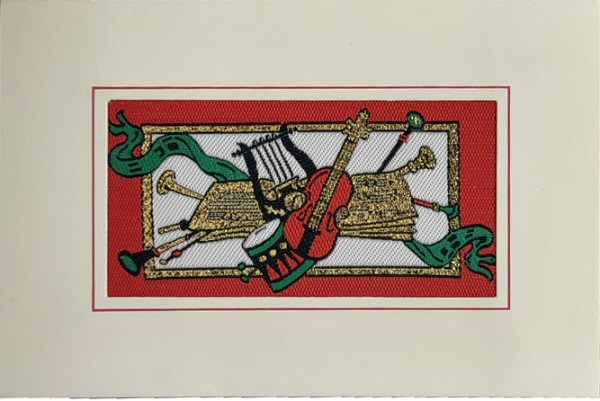 J & J Cash woven Christmas card, with no words, just image of various musical instruments