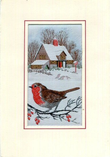 J & J Cash woven Christmas card, with no words, with image of a Robin on branch with house in the background
