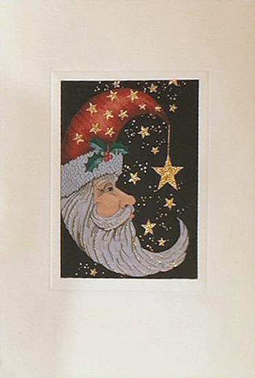 J & J Cash woven Christmas card, with no words, just image of Father Christmas' head, with a star
