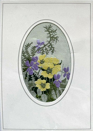 J & J Cash woven flower card, with image of yellow and purple flowers)