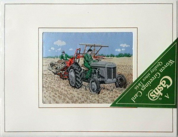 J & J Cash woven card, with no woven words, just an image of a Fordson Tractor pulling an harvester