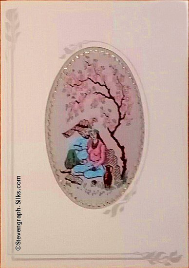 J & J Cash woven card, with no words, but image of two lovers under a tree