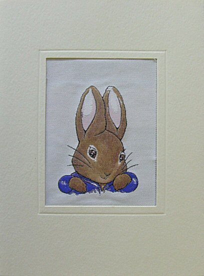 J & J Cash woven card, with no words, just portrait image of Peter Rabbit