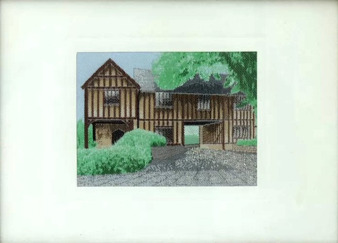 J & J Cash woven card, with no words, and image of a timber framed building