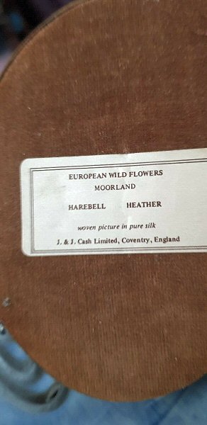 label attached to the back of this picture