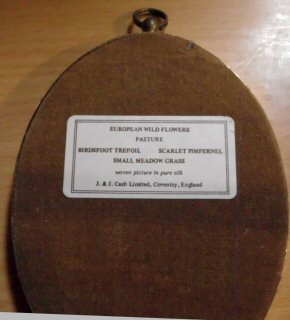 label attached to the back of this picture