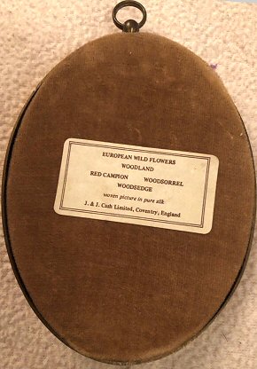 label attached to the back of this picture