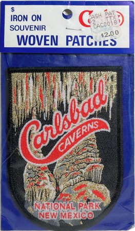J & J Cash woven saw-on label with words: Carlsbad Caverns National Park, New Mexico