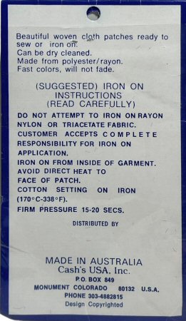 J & J Cash woven saw-on label reverse