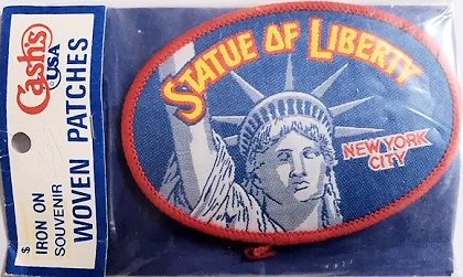 J & J Cash woven saw-on label with words: Statue of Liberty - New York City