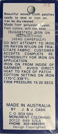 J & J Cash woven saw-on label reverse