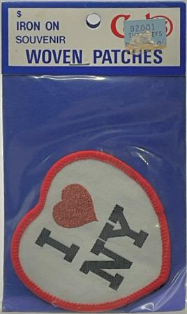 J & J Cash woven saw-on label with words: I (heart) N Y