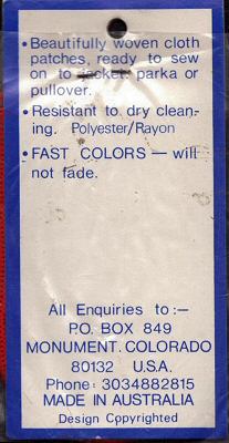 J & J Cash woven saw-on label reverse