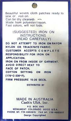 J & J Cash woven saw-on label reverse