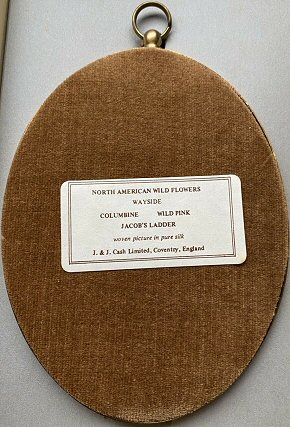 label attached to the back of this picture