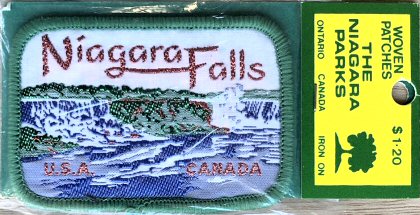 J & J Cash woven saw-on label words: Niagara Falls, USA & Canada
