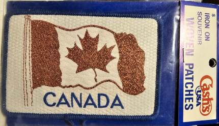 J & J Cash woven saw-on label words: Concorde, on runway