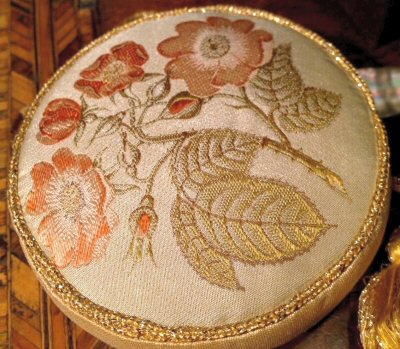 J & J Cash pin cushion with woven image of roses
